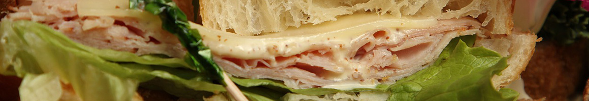 Eating Sandwich Salad at Greater Grinders Submarines restaurant in Norfolk, VA.